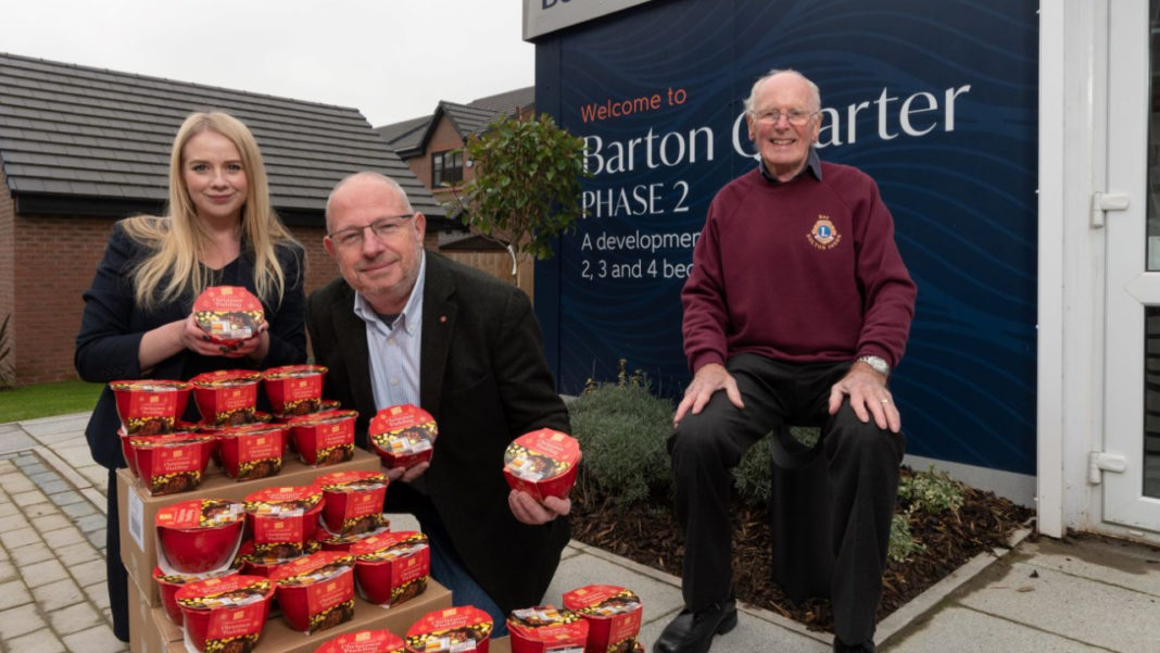 Bolton charities receive festive donation from Bellway Business Mondays