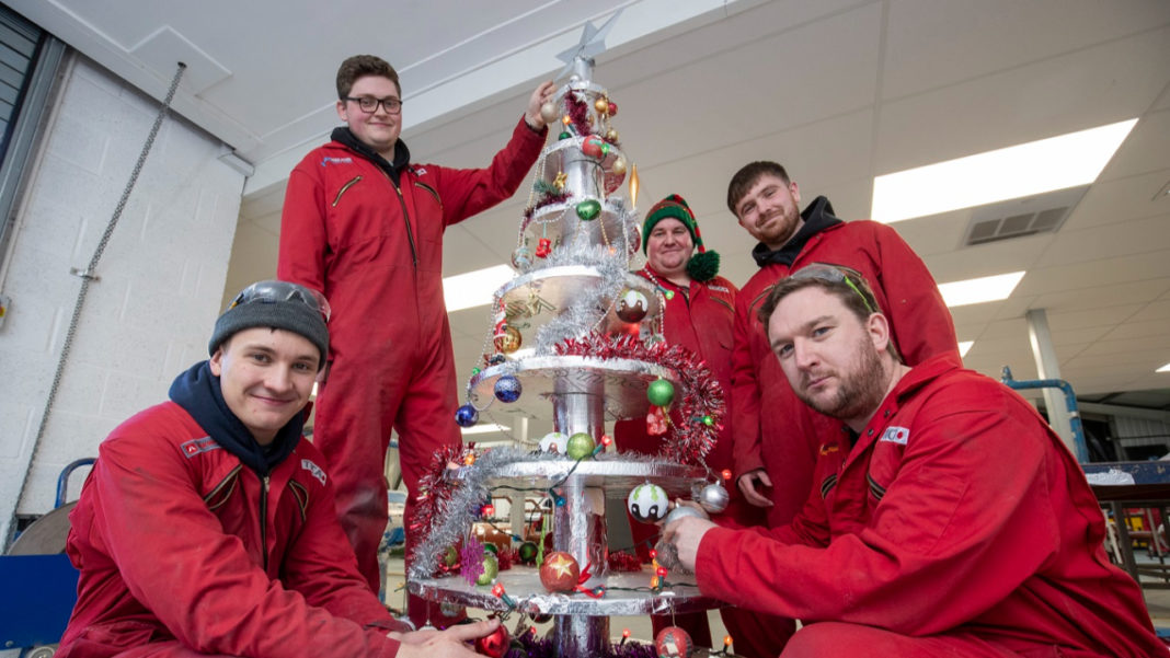 TICA apprentices step into Christmas by fashioning a Christmas tree out