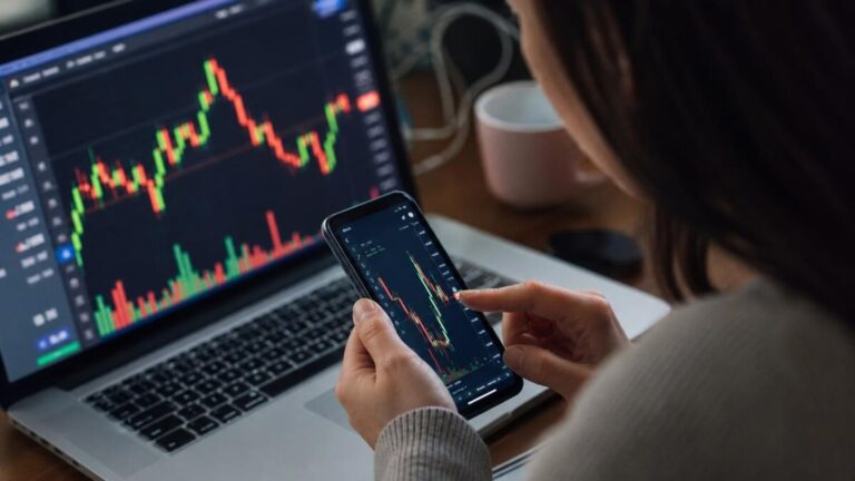 Person viewing financial charts